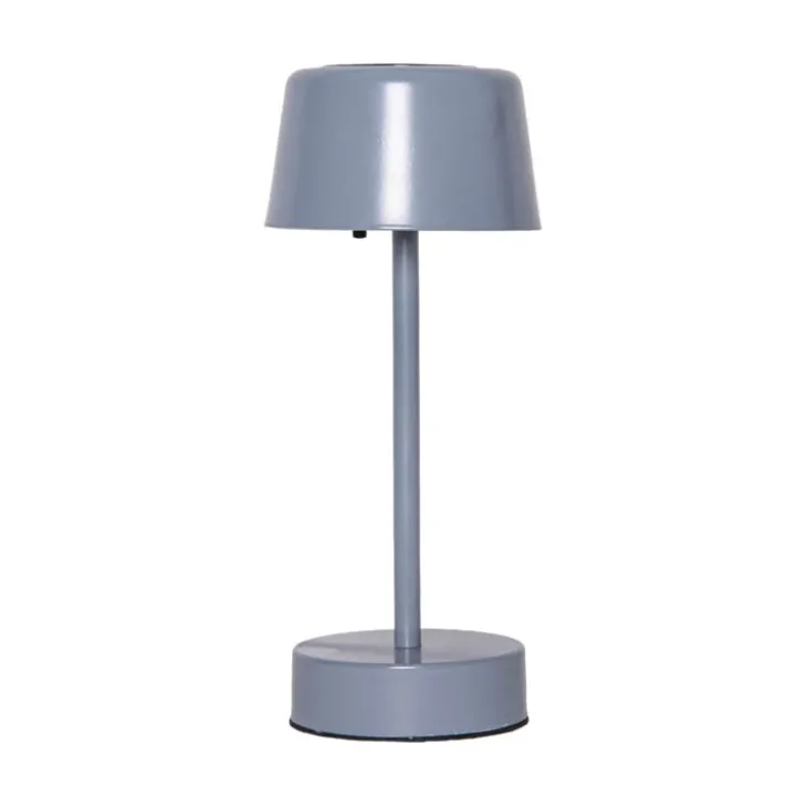 Liten solcellsladdad bordslampa