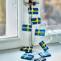 Ljusslinga med svenska flaggor